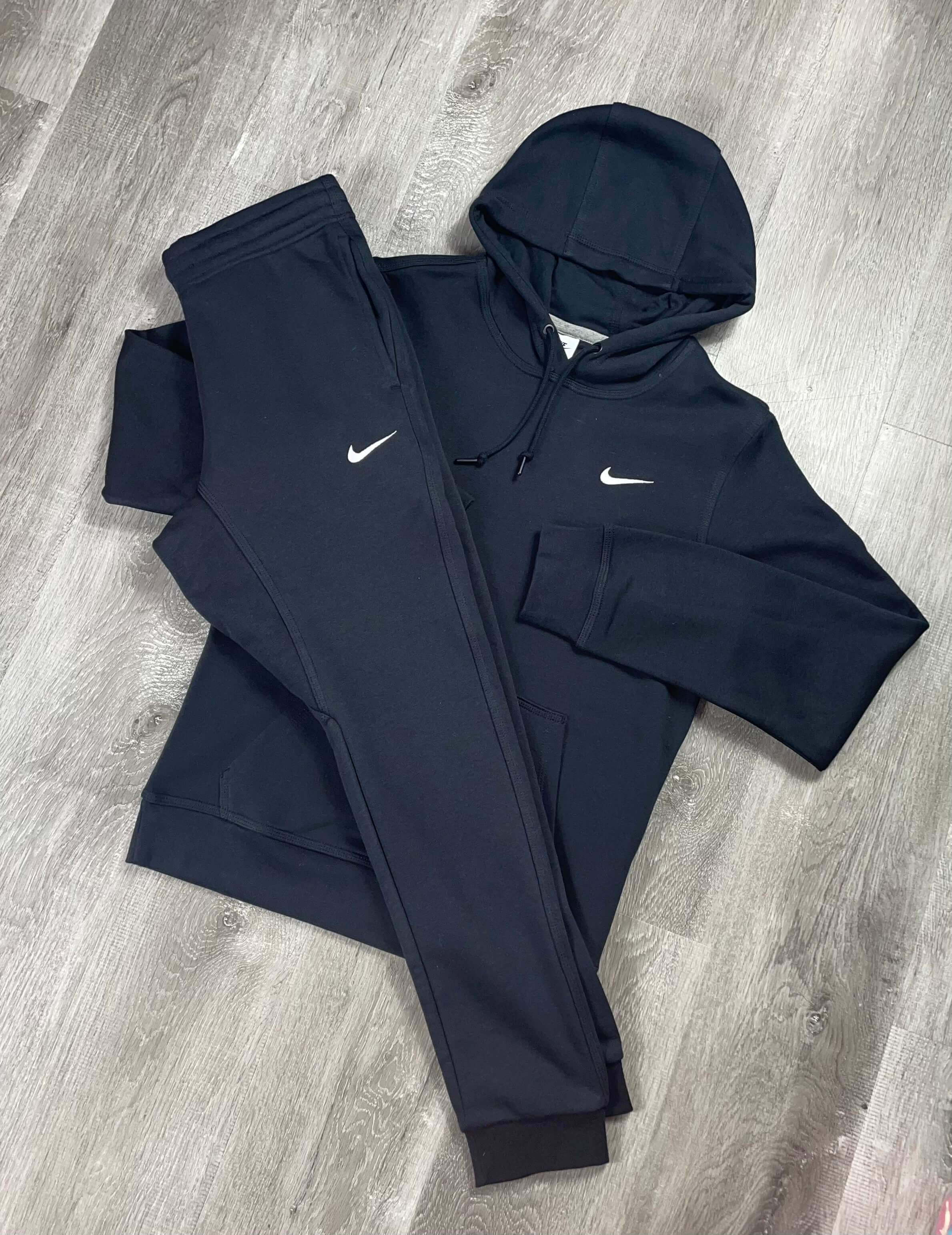 Nike tracksuit uk on sale